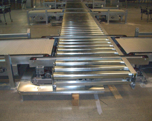 Transportador de rodillos para el manejo de palets en instalaciones industriales